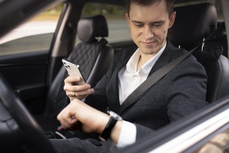 man-driving-his-elegant-car-taxi-services-min man-driving-his-elegant-car-taxi-services-min